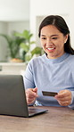Credit card, laptop and woman in home with online shopping, ecommerce or fintech payment. Debit, technology and Asian female person on computer for internet banking for subscription in apartment.