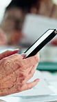 Businesswoman, hands and typing in meeting with phone, text message and distraction from finance audit. Person, browsing and scroll in office with tech, accounting team and check email notification.