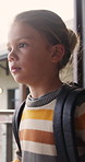 Walking, student or child with thinking at school, learning journey or lesson reflection for education. Academy, serious or girl with mindset for academic development, future or study for knowledge