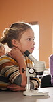 Child, education and listening to lesson in classroom, academic development or learning life science. Elementary school, students and kids with cognitive growth, curriculum and chemistry knowledge
