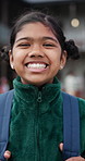 Face, education and kid with smile at school for knowledge, growth and future development at academy. Portrait, girl and happy child at elementary for learning, academic student and backpack outdoor