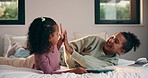 Siblings, tablet and high five on bed for learning, bonding or development together in home. Success, praise and person with support for girl with digital quiz, test or good answer on educational app