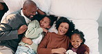 Face, family and children relax on bed above with bonding, cuddle and happiness in home. Smile, playful and mother with father laughing and hug daughter for weekend fun, connection and comfort