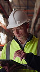Logistics, man or typing on tablet in warehouse to manage inventory, verify shipment or export. Depot inspector, mature person or shipping app to update delivery log, cargo inspection or supply chain