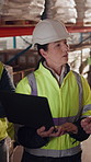 Manager, team and supply chain in warehouse with laptop, quality assurance and advice for operations. Mature woman, talk and coworkers with computer, logistics update and instructions for shipping.