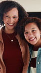 Happy, hug and face of mother with child in home for bonding, love and connection together. Smile, care and portrait of mom embracing girl kid in living room for safety, family or support in house.