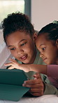 Children, sisters and tablet on bed with smile, games and online contest with bonding, love and connection. Happy kids, girl and tech for play on app, streaming and digital puzzle in family house