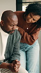 Upset, discussion and African couple with hug for comfort, bankruptcy stress and support for partner. Talking, care or mature people with worry for income problem, financial crisis or embrace in home