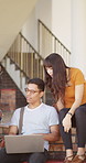 People, students and talk with laptop at campus for education, study session and exam revision. Friends, pc or chatting with textbook for tuition, academic learning and test preparation at university