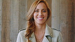 Face, business and happy woman with laugh by wooden wall, professional and confidence for hiring. Portrait, recruiter and hr manager with pride for talent acquisition, headhunter career and about us