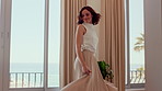 Travel, dancing and woman in hotel room with fun, getaway optimism and happiness on summer holiday. Trip, movement or female person with good time, vacation enjoyment or playful energy at resort.