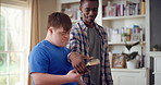 Books, friends and men with discussion in home for bonding, choice and social hangout on weekend. Relax, people and person with down syndrome with literature for learning, support and chill together
