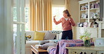 Girl, dancing or home with music, vibe or energy for fun holiday, weekend or comfort on sofa. Child, kid or teenager with playful movement in living room for summer celebration or excitement in house