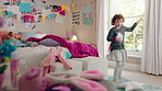 Dancing, hoop and child in bedroom with energy, rhythm or exercise with radio on weekend. Groove, creative and girl kid moving to playlist with toy for growth, fun and development in apartment.