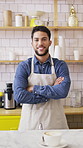 Serving, man and face of barista in cafe with coffee for customer order, service or hospitality career. Portrait, cappuccino and waiter with cup of warm beverage for purchase in restaurant or diner.