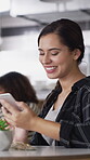 Laugh, texting and woman in coffee shop with phone, online communication and comic post on social media. Happy, digital and person in cafe with tech, funny message or meme reaction on chat app.