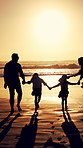 Walking, silhouette and family holding hands for beach sunset, family holiday and weekend travel trip. Back, people and children with hat for seaside vacation, mockup space and sunshine for journey