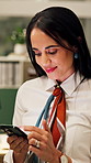 Businesswoman, smile and scroll in office with phone, check company notification and email response. Happy, person and browsing in workplace with tech, social media update and text message for job.