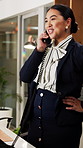 Happy, receptionist and woman in hotel, phone call and communication with guest and customer service. Laughing, concierge and person with telephone for discussion, hospitality and talking in motel