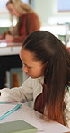 Students, college and girl in class for writing notes, studying and learning in lesson. School, academy and person with notebook for education, knowledge and prepare for exam in lecture at university