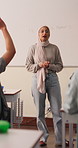 Students, answer, Muslim woman in classroom for education, knowledge and conversation with learners. School, educator and person with hijab, discussion and teaching lesson with smile and explanation