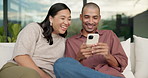 Happy, couple and laughing with phone on sofa for funny entertainment, humor or comedy in home. Man, woman or joke with smartphone app for social media post or bonding together on couch in house