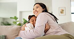 Smile, mother and child with hug on sofa for bonding together, weekend break and connection. Childcare, happy woman and girl kid with embrace in house for healthy relationship, affection and security