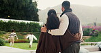 Pride, parents or children in backyard with hug, childcare support or bonding fun in child growth. Back, run or family at home with embrace, connection or parenting together in childhood development.