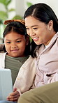 Laughing, mom and child with tablet, home and watching movies with app subscription or entertainment. Woman, online and relax with daughter on couch, chill and streaming funny film with tech in house