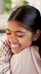 Smile, mother and child with hug in home for connection, security and care for family time together. Bonding, happy woman and daughter with embrace for childhood support, trust and love for affection