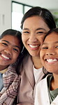 Happy, mother and children in house with face, healthy relationship or bonding together for child growth. Laugh, support or Asian family with smile, childcare or connection for childhood development.
