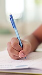 Education, hands and child writing a test for math assessment, equation solution and knowledge. Answer, kid and numeracy assignment in classroom for problem solving, development and exam evaluation