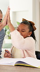 Dad, child and high five with math homework for problem solving, study support or excited for answer. Education, father and kid with celebration in home for solution, equation success and knowledge