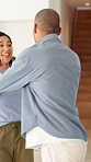 Love, dance and couple in home with music, fun or bonding together in living room with energy. Happy, smile and man with woman for moving to playlist, album or radio for entertainment in apartment