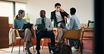 Team, meeting and business people in cafe on tech for planning, project strategy and feedback. Coffee shop, creative and men with women on tablet, laptop and talking for campaign, idea and proposal