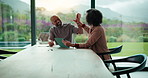 Couple, tablet and high five for finance in house with smile, discussion or approval for home loan. People, woman and man with digital tech for budget, documents and income for savings in kitchen