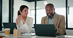 Laptop, discussion and business people in office with feedback on company revenue growth. Computer, meeting and financial advisor with manager for review on investment proposal in workplace.