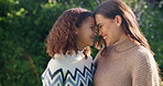 Outdoor, happy and mom with child, home and laugh with daughter and confident with family connection. Woman, love and embrace with kid in backyard, forehead touch and together on weekend at house