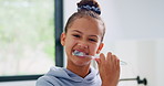 Child, face and brushing teeth with toothbrush in bathroom for dental hygiene or cleaning in home. Portrait, girl or kid in POV with morning routine for oral soap, mouth or gum healthcare in house