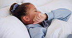 Sick, girl and bed with cough, virus or fever for influenza, symptoms or viral infection in home. Child, kid and cold with flu or sinus in bedroom sheets for hayfever, allergy or germs in house