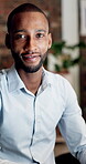 Business, face and man with smile in office for marketing internship, new job and confidence. Creative intern, black person and happy at media agency for career development, about us and opportunity