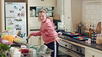 Music, headphones and child dance in kitchen with energy, streaming service and song playlist. Excited girl, audio and moving at home with rhythm for sound, freedom and listening to radio on weekend