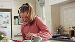 Music, headphones and kid dance with snack, streaming service and song playlist in kitchen. Excited girl, audio and moving at home with rhythm for sound, listening to radio and eating in morning