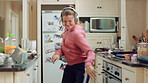 Audio, headphones and kid dance in kitchen with energy, streaming service and album playlist. Excited girl, music and moving at home with phone for sound, freedom and listening to radio with rhythm