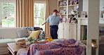 Hat, dancing and man with down syndrome in living room, practice performance and music for rhythm. Weekend celebration, cap and person with singing for expression, entertainment and groove for fun