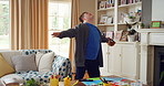 Man, dancing and fun in lounge, education and celebration for finished project on laptop or success. Student, rhythm and person with down syndrome on study break, achievement and movement in home