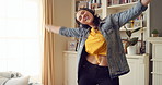 Dance, home and happy woman with headphones with music for good mood, positivity or relax on weekend. Singing, apartment and person with audio, radio and playlist for movement, energy and rhythm