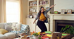Dancing, home and woman with headphones with music for good mood, positivity and relax on weekend. Happy, apartment and person with audio, radio and playlist for movement, energy and rhythm for break