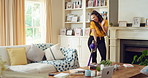 Woman, vacuum and dance in house with headphones, household chores or listen to music on weekend. Happy person, appliance and singing in home with housekeeping, fun or audio tech for streaming song.