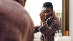 Black man, mirror and comb in bathroom for haircare, morning routine and grooming. Male person, reflection and dancing with cosmetic brush to style afro, scalp maintenance and hair growth at house